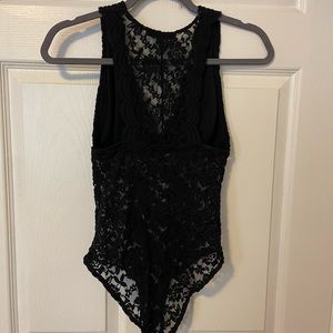 Black lace body suite